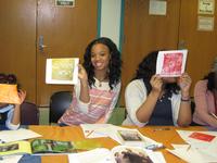 Angelina shows off her creation during an afterschool PAFA printmaking workshop.